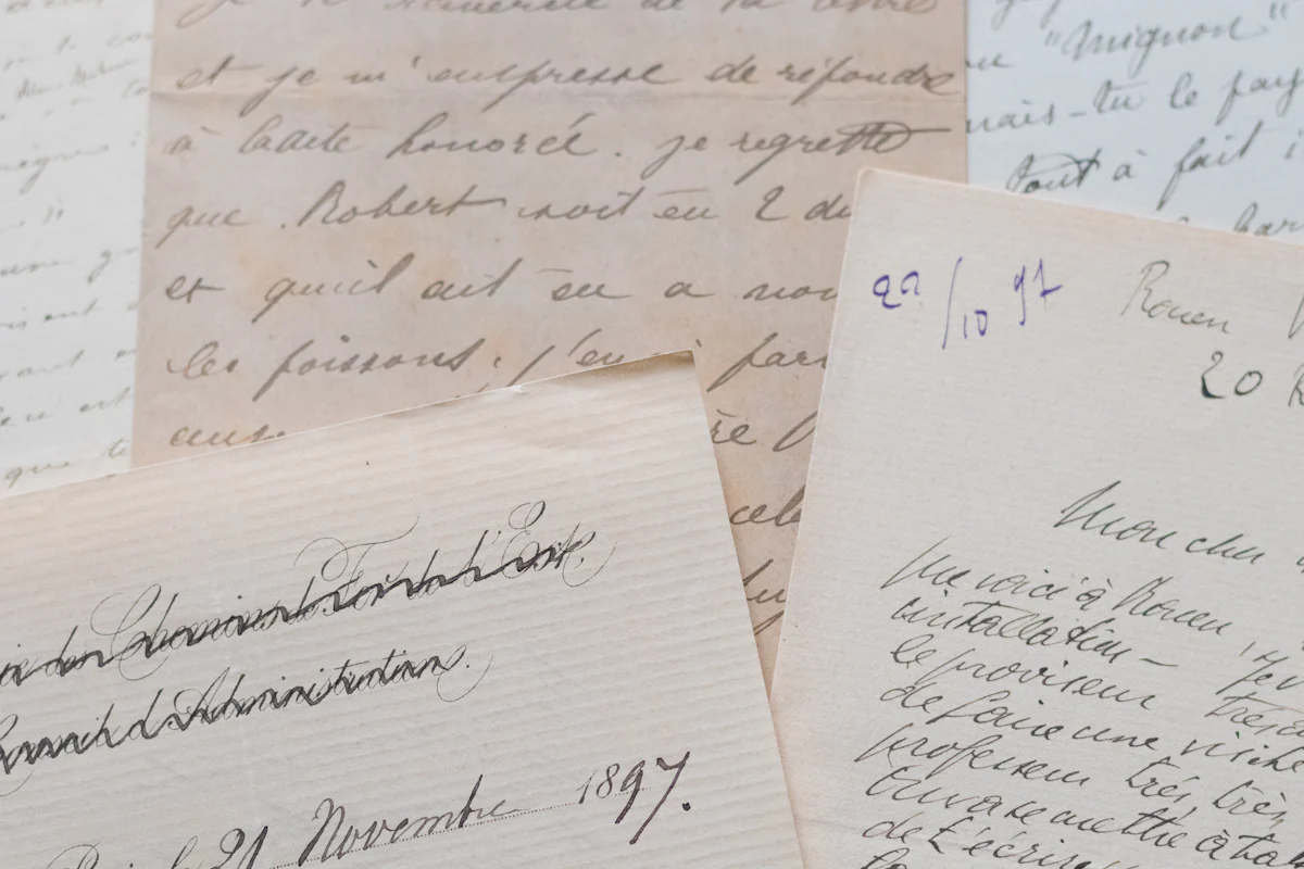 Old handwritten letters in French, one dated 1897